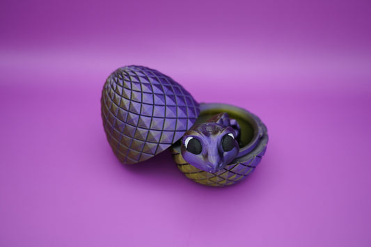 Huevo con Serpiente Articulada - Criatura tierna